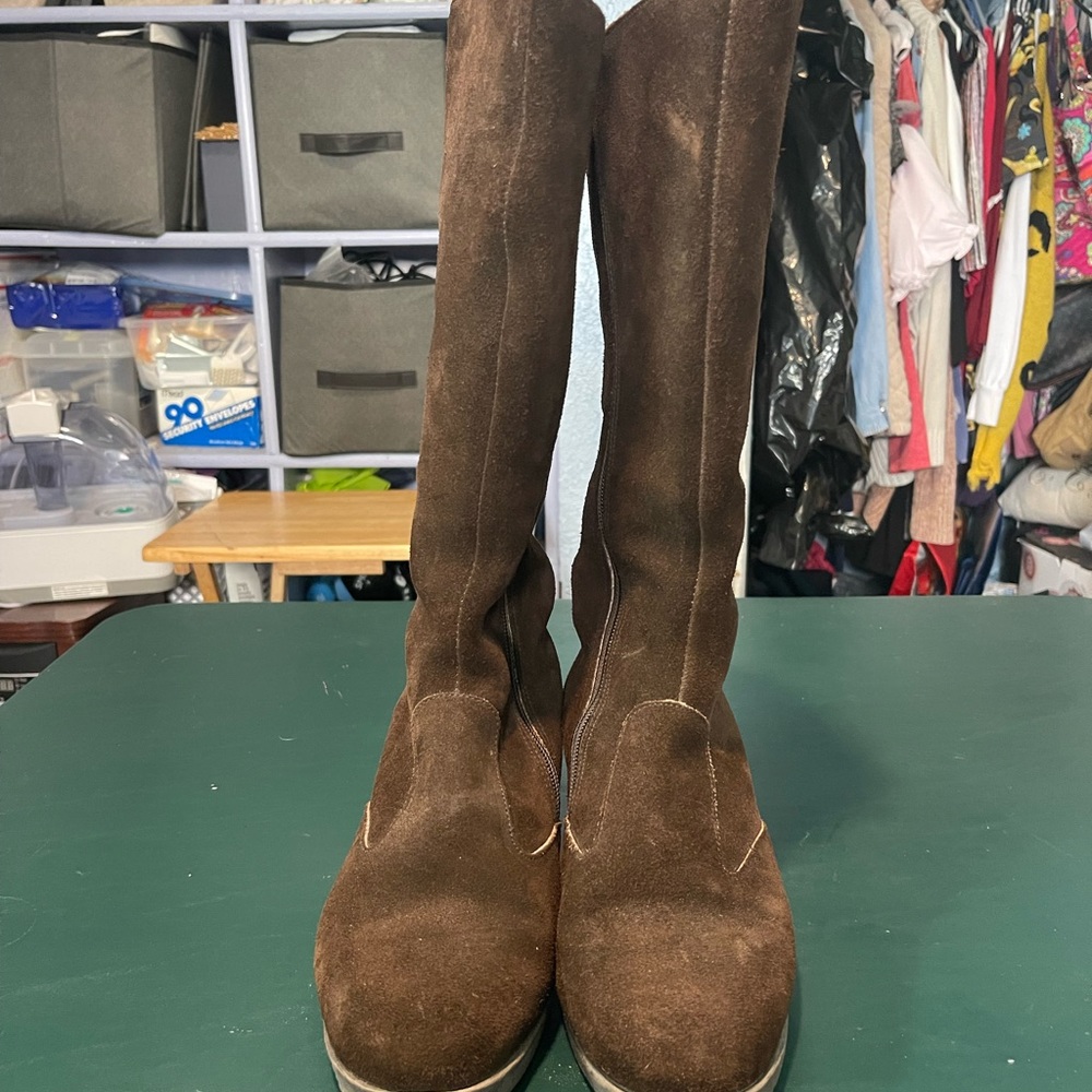 Women’s size 7 knee high boots by Richard Draper